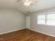 Bedroom featuring ceiling fan, closet, and window at 116 Old Maple Ln, Durham, NC 27713