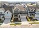 Stunning aerial view of a two-story home nestled in a friendly, suburban community at 1245 Porters Call Dr, Wendell, NC 27591