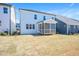 A screened porch extends the living space to the backyard, offering a relaxing retreat in this inviting community at 1245 Porters Call Dr, Wendell, NC 27591