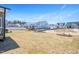 Spacious backyard featuring newly planted grass and landscaping, surrounded by neighboring homes in a Gathering-friendly community at 1245 Porters Call Dr, Wendell, NC 27591