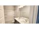 Bathroom featuring a double sink vanity, a bathtub with shower, and modern fixtures at 1245 Porters Call Dr, Wendell, NC 27591