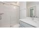 Modern bathroom featuring a glass-enclosed shower, sleek vanity, and contemporary fixtures at 1245 Porters Call Dr, Wendell, NC 27591