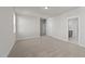 Carpeted bedroom with natural light at 1245 Porters Call Dr, Wendell, NC 27591