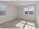 Bright bedroom with neutral walls and carpet at 1245 Porters Call Dr, Wendell, NC 27591