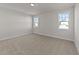 Bedroom featuring carpeted floors and natural light at 1245 Porters Call Dr, Wendell, NC 27591