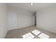 Minimalist bedroom with neutral walls and carpet at 1245 Porters Call Dr, Wendell, NC 27591