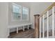 Entryway nook featuring a built-in bench with storage underneath and natural light at 1245 Porters Call Dr, Wendell, NC 27591