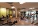 A modern gym with exercise machines and free weights, providing residents with a convenient fitness center at 1245 Porters Call Dr, Wendell, NC 27591