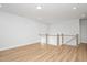 Spacious loft area with hardwood flooring and ample natural light, perfect for flexible living at 1245 Porters Call Dr, Wendell, NC 27591