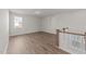 Second story loft featuring hardwood flooring and natural light at 1245 Porters Call Dr, Wendell, NC 27591