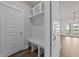 Mudroom features custom built-ins and a convenient bench at 1245 Porters Call Dr, Wendell, NC 27591