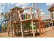 An elaborate wood playground with climbing structures and slides provides a fun recreational area for  at 1245 Porters Call Dr, Wendell, NC 27591