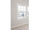 Bright room with plush carpet and large windows overlooking the neighborhood at 1245 Porters Call Dr, Wendell, NC 27591