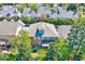 Aerial view of home highlighting roofline, landscaping, and neighborhood context at 1309 Pecora Ln, Raleigh, NC 27607