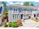Beautiful two-story home showcasing manicured landscaping, a two-car garage, and inviting curb appeal at 1309 Pecora Ln, Raleigh, NC 27607