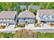 Street view of home with manicured lawn, well-maintained landscaping, and welcoming curb appeal at 1309 Pecora Ln, Raleigh, NC 27607