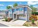 Two-story home with attached garage, manicured lawn and beautiful landscaping at 1309 Pecora Ln, Raleigh, NC 27607