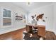 Bright and airy office with hardwood floors, a wooden desk, and natural light at 1309 Pecora Ln, Raleigh, NC 27607