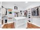 Spacious walk-in closet with custom shelving and ample storage space for clothes and accessories at 1309 Pecora Ln, Raleigh, NC 27607