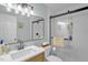 Modern bathroom showcasing sleek lighting, contemporary fixtures, and a frameless glass shower at 1487 Kentucky Ave, Sanford, NC 27332