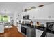Kitchen featuring stainless steel appliances, granite counters and white cabinets at 1487 Kentucky Ave, Sanford, NC 27332