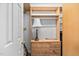 Bright closet features built in shelving and drawers for organization at 1500 St Andrews Dr, Mebane, NC 27302