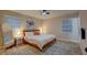 Inviting bedroom with a cozy bed, accent rug, and soft natural light at 1536 Dirkson Ct, Cary, NC 27511