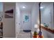 Bright foyer features light hardwood floors, neutral walls, and a decorative mirror enhancing the space at 1536 Dirkson Ct, Cary, NC 27511