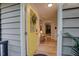 Inviting front door painted yellow with glass panes and a decorative wreath, opening to a light-filled home at 1536 Dirkson Ct, Cary, NC 27511