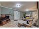 Inviting living room with a plush sectional sofa, modern decor, and access to the outdoor area at 1536 Dirkson Ct, Cary, NC 27511