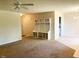 Open living room featuring neutral colors and built-in storage at 164 Sue Dr, Angier, NC 27501