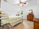 Attic bedroom with neutral walls and carpet, sloped ceilings, and lots of natural light at 2001 Virginia Dare Pl, Raleigh, NC 27610