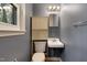 Cozy bathroom with unique sink and natural lighting at 208 Clark Lake Rd, Durham, NC 27707
