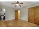 Bedroom features hardwood floors, closet, and adjacent bathroom access at 208 Clark Lake Rd, Durham, NC 27707