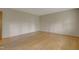 Bright bedroom featuring hardwood floors, neutral walls, and ample natural light at 208 Clark Lake Rd, Durham, NC 27707