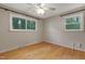 Bedroom offering ample natural light, hardwood floors, and neutral colors at 208 Clark Lake Rd, Durham, NC 27707