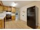 Functional kitchen featuring wood cabinets, stainless steel appliances, and a bright, airy atmosphere at 208 Clark Lake Rd, Durham, NC 27707