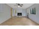 Spacious living room with fireplace and natural light at 208 Clark Lake Rd, Durham, NC 27707