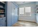 Charming bedroom with built-in storage and a window, perfect for maximizing space and enjoying natural light at 21 Davidson St, Clayton, NC 27527