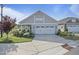 Charming home with a two-car garage, manicured lawn, and well-maintained landscaping at 21 Davidson St, Clayton, NC 27527
