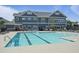 Community pool with ample seating, offering a relaxing and enjoyable outdoor experience at 21 Davidson St, Clayton, NC 27527