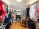 Organized walk-in closet with custom shelving and ample storage space at 2113 Rockwall Farms Ln, Fuquay Varina, NC 27526