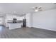 Bright kitchen with white cabinetry, granite countertops, and stainless steel appliances at 2116 Willow Gln Dr, Graham, NC 27253