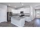 Modern kitchen featuring stainless steel appliances, granite countertops, and white cabinetry at 2126 Willow Gln Dr, Graham, NC 27253