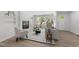 Bright living room with fireplace, hardwood floors and natural light at 216 Burkwood Ln, Raleigh, NC 27609