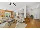 Stylish living room with hardwood floors, built-in shelving, and an open floor plan at 216 Dairyland Rd, Chapel Hill, NC 27516