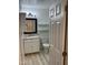 Bathroom featuring a vanity, framed mirror, storage cabinet, and tiled floors at 2305 Summit Dr, Hillsborough, NC 27278