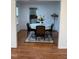Dining room with hardwood floors, a table with chairs, and natural light at 2305 Summit Dr, Hillsborough, NC 27278
