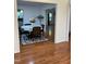 View of dining room with hardwood floors, a table with chairs, and natural light at 2305 Summit Dr, Hillsborough, NC 27278