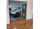 View of dining room with hardwood floors, a table with chairs, and natural light at 2305 Summit Dr, Hillsborough, NC 27278